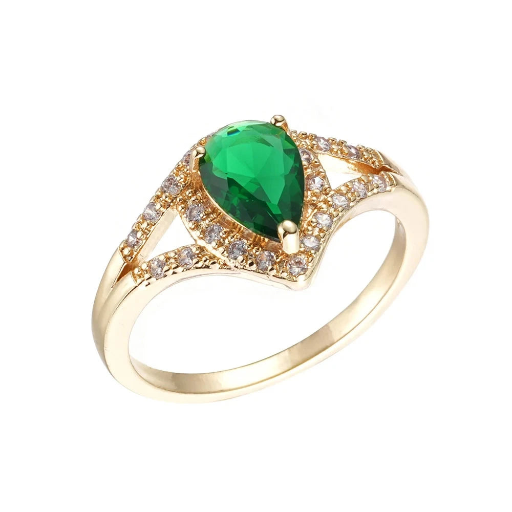 Anillo elegante de mujer con circonitas verdes en color dorado 