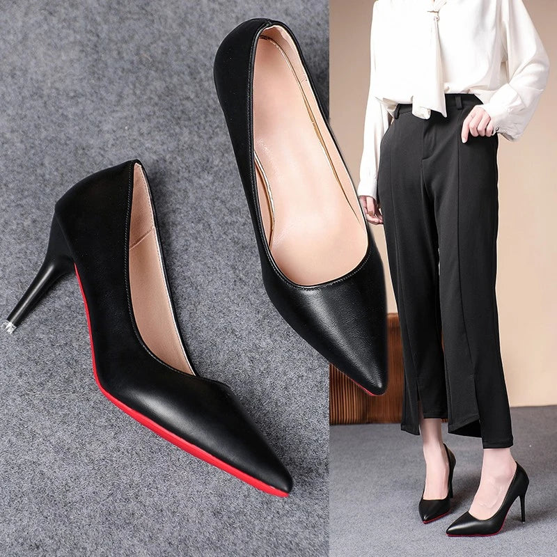 Woman's Black Heels With Red Soles