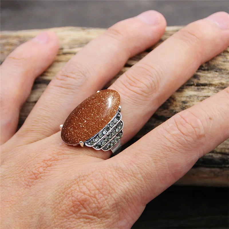 Anillo vintage en forma de ojo bañado en plata con piedra natural